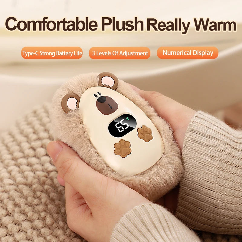 Chaufferette de Poche en Peluche — trois températures, rechargeable