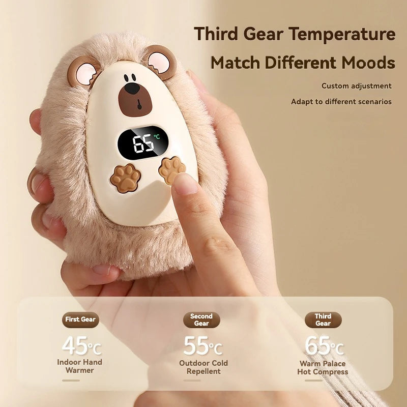 Chaufferette de Poche en Peluche — trois températures, rechargeable